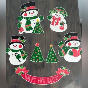 Vintage die cut snowman family 
7 pieces